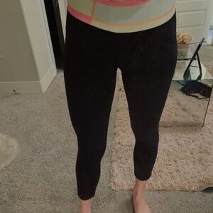 Lululemon leggings size 4 women’s. Used. Black with colorful band at the top.